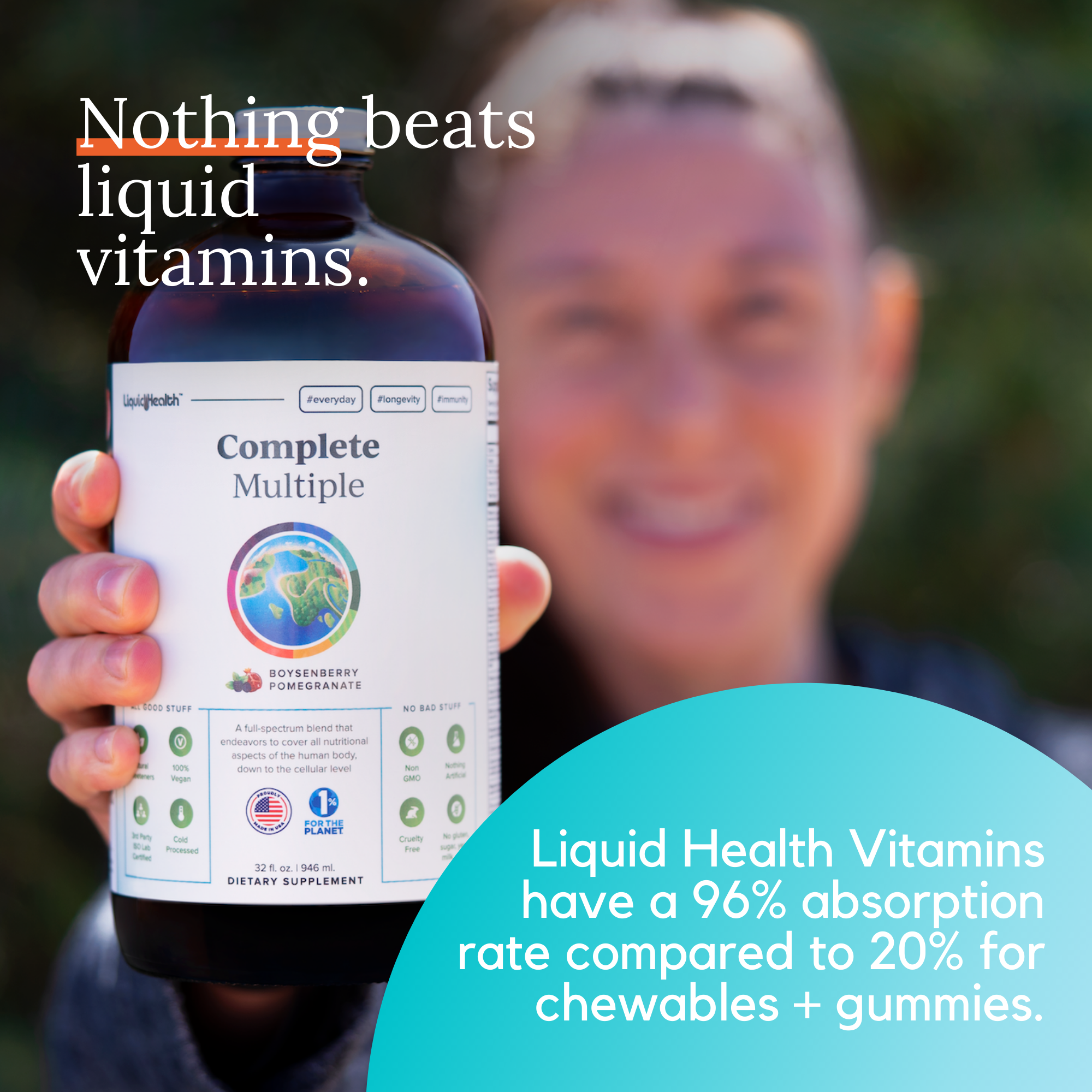Woman holding liquid multivitamin bottle outdoor