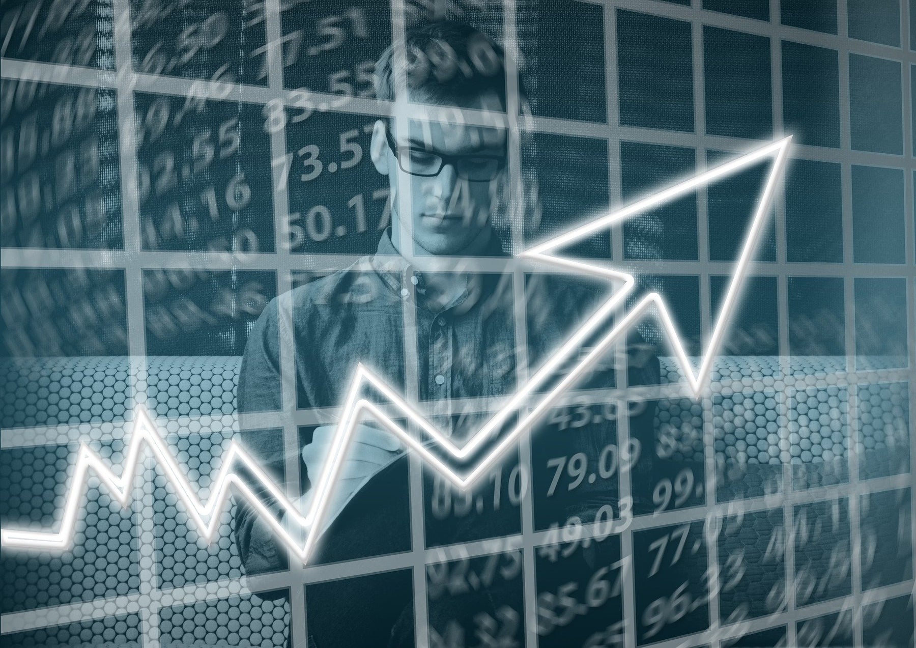 Man thinking covered by a graph pointing up