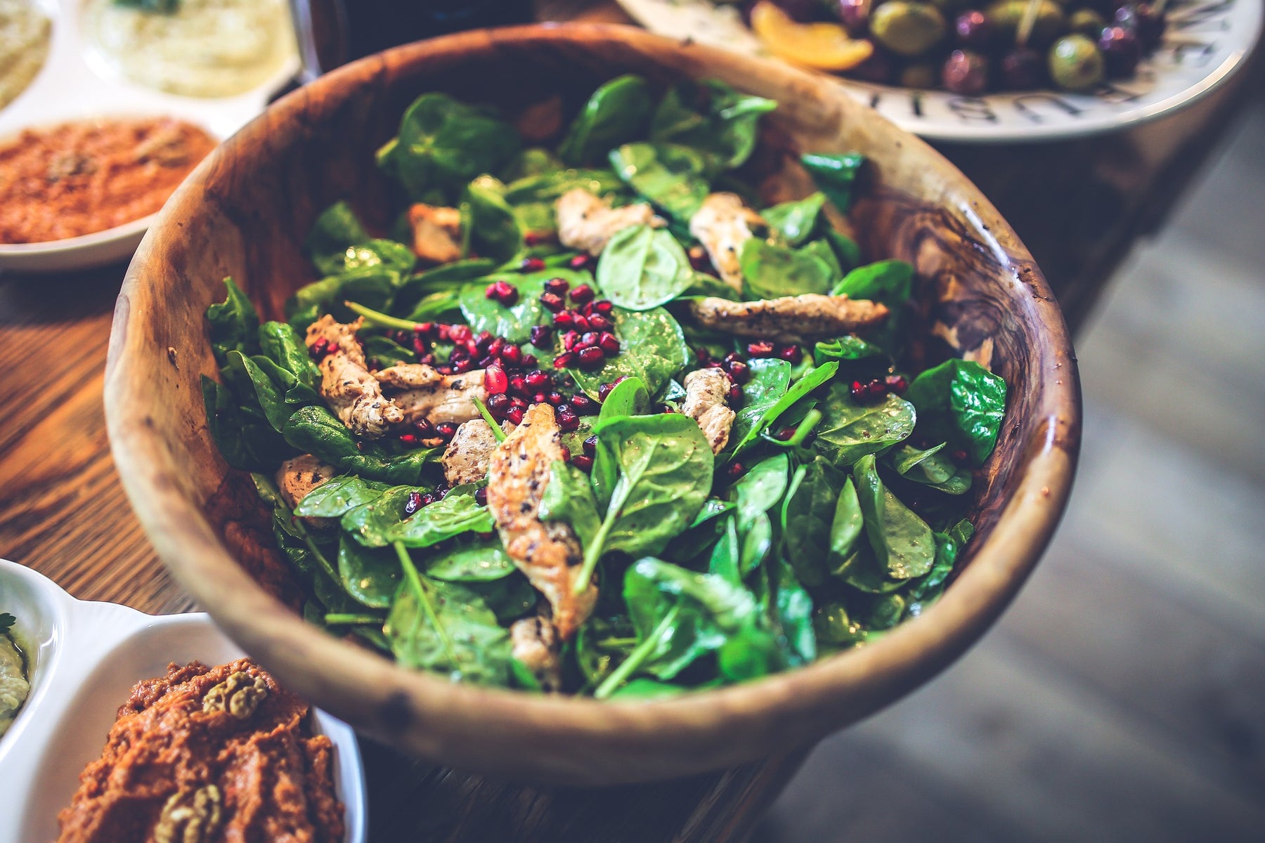 A bowl of salad on a table