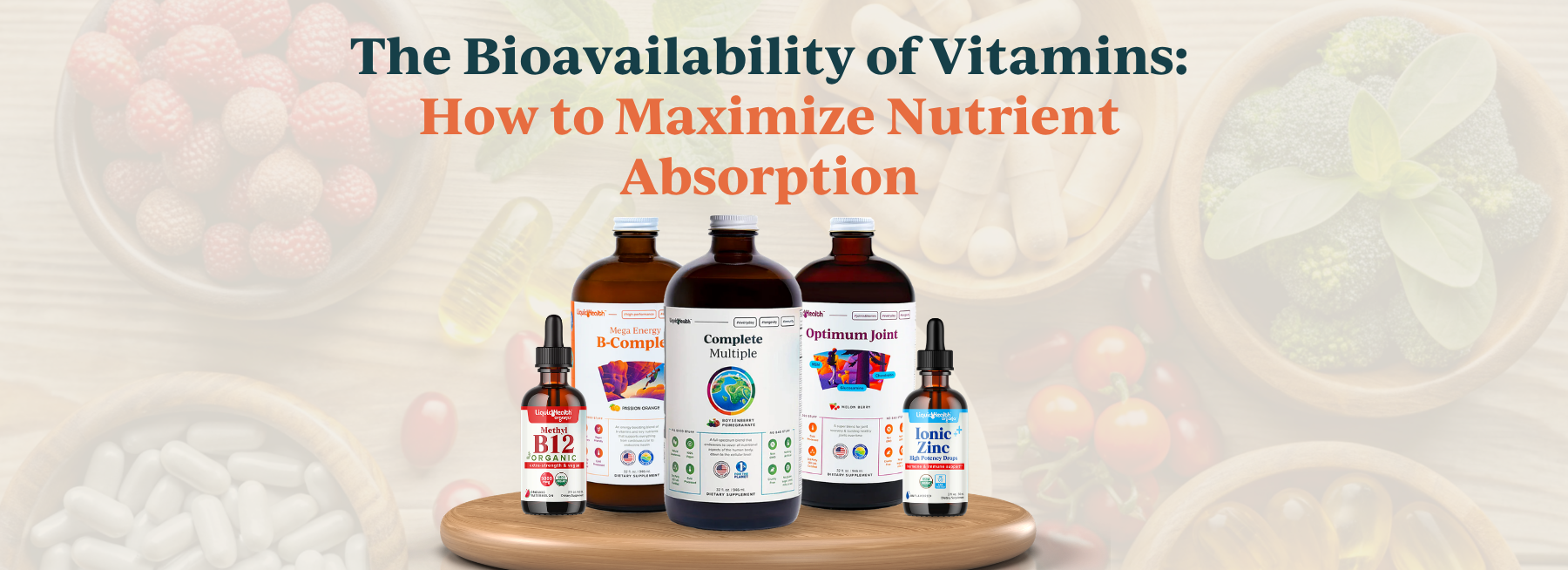 Five Liquid Health bottles on a wooden stand, with blurred fruits, vegetables, and pills in the background.