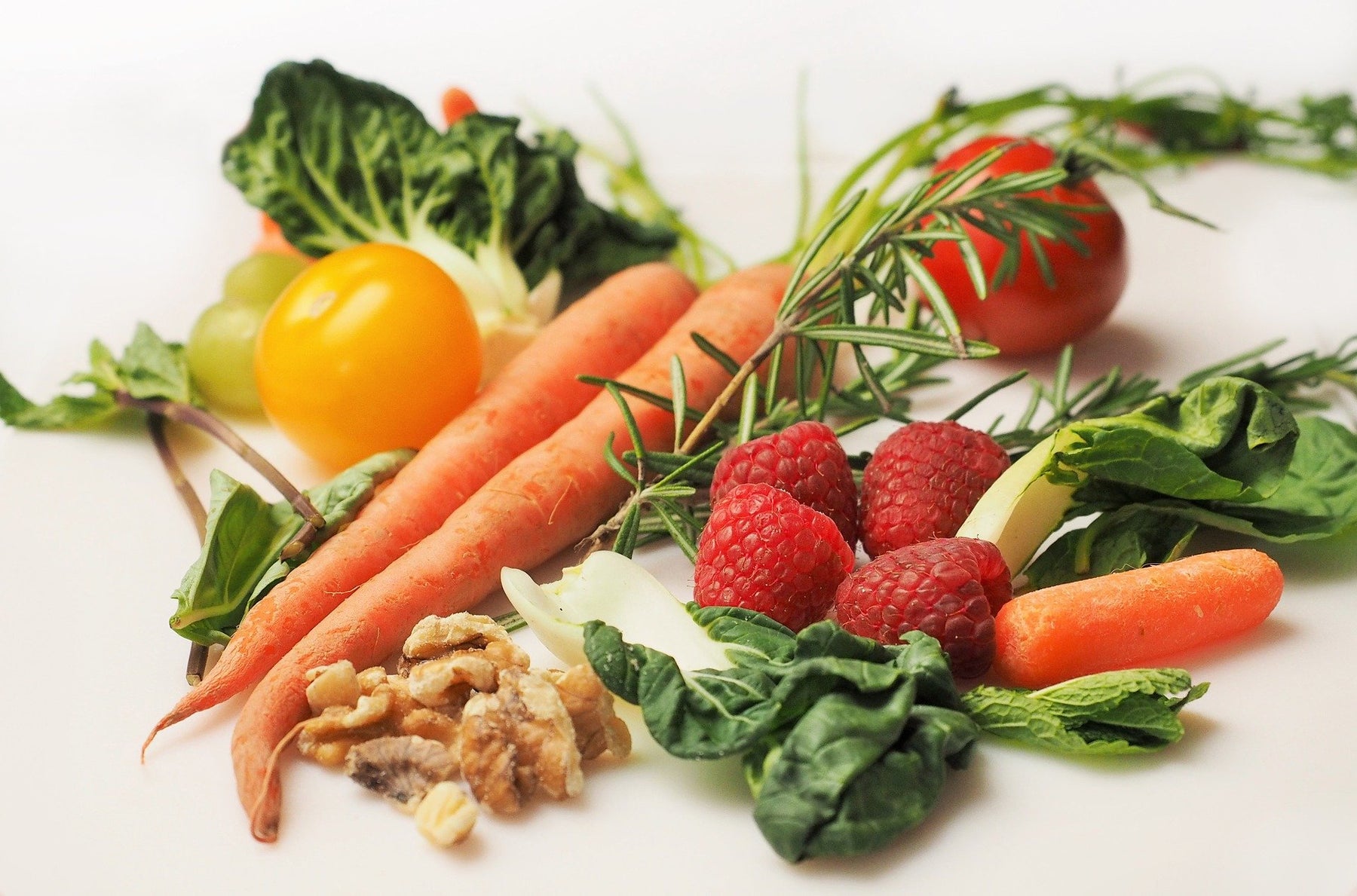 Fruits and vegetables laying on a table