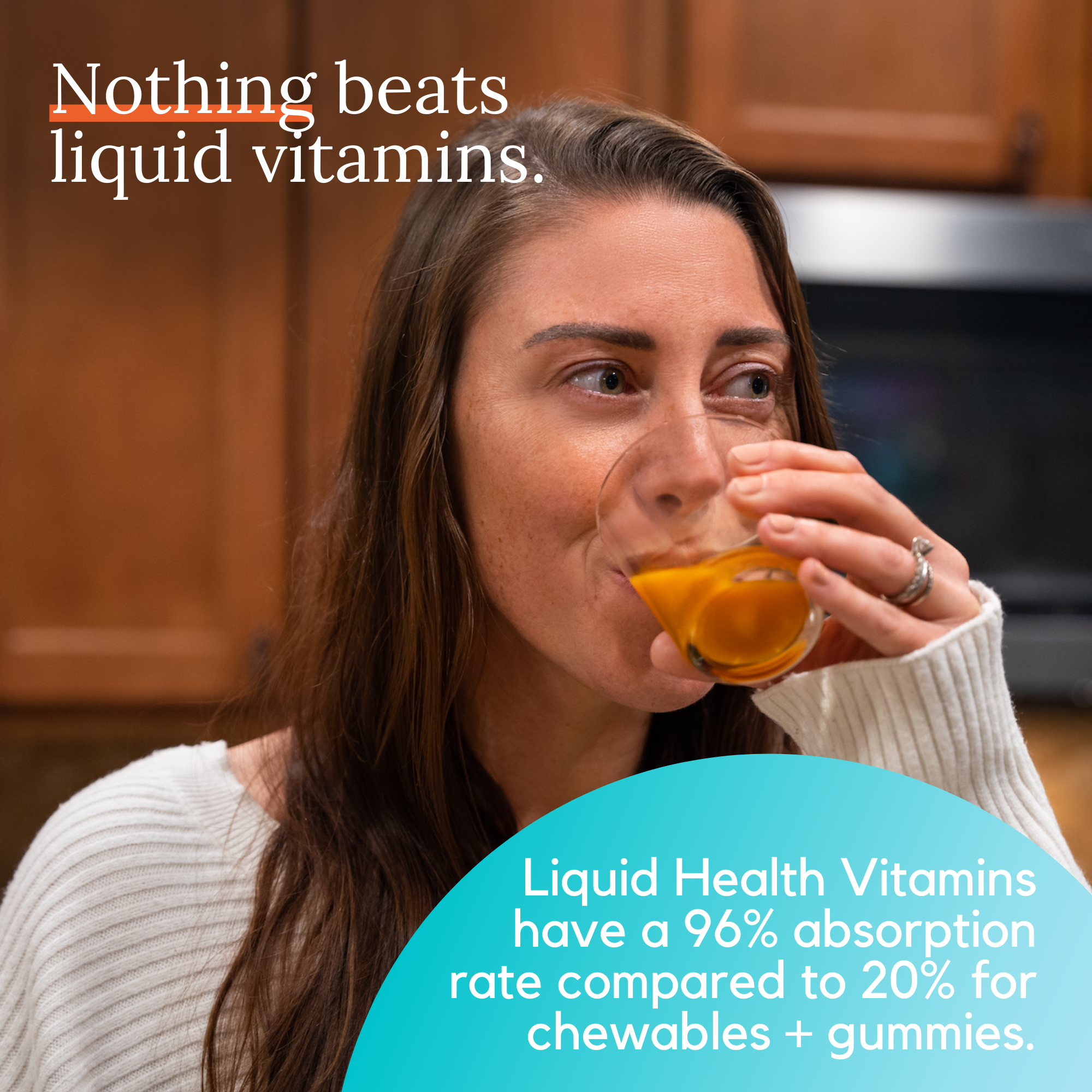 Woman drinking liquid prenatal vitamins